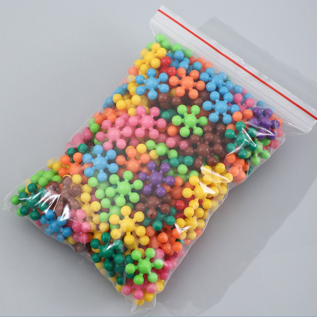 Montessori Lernspielzeug Schneeflocken – Bunte Bausteine zum Stecken & Bauen
